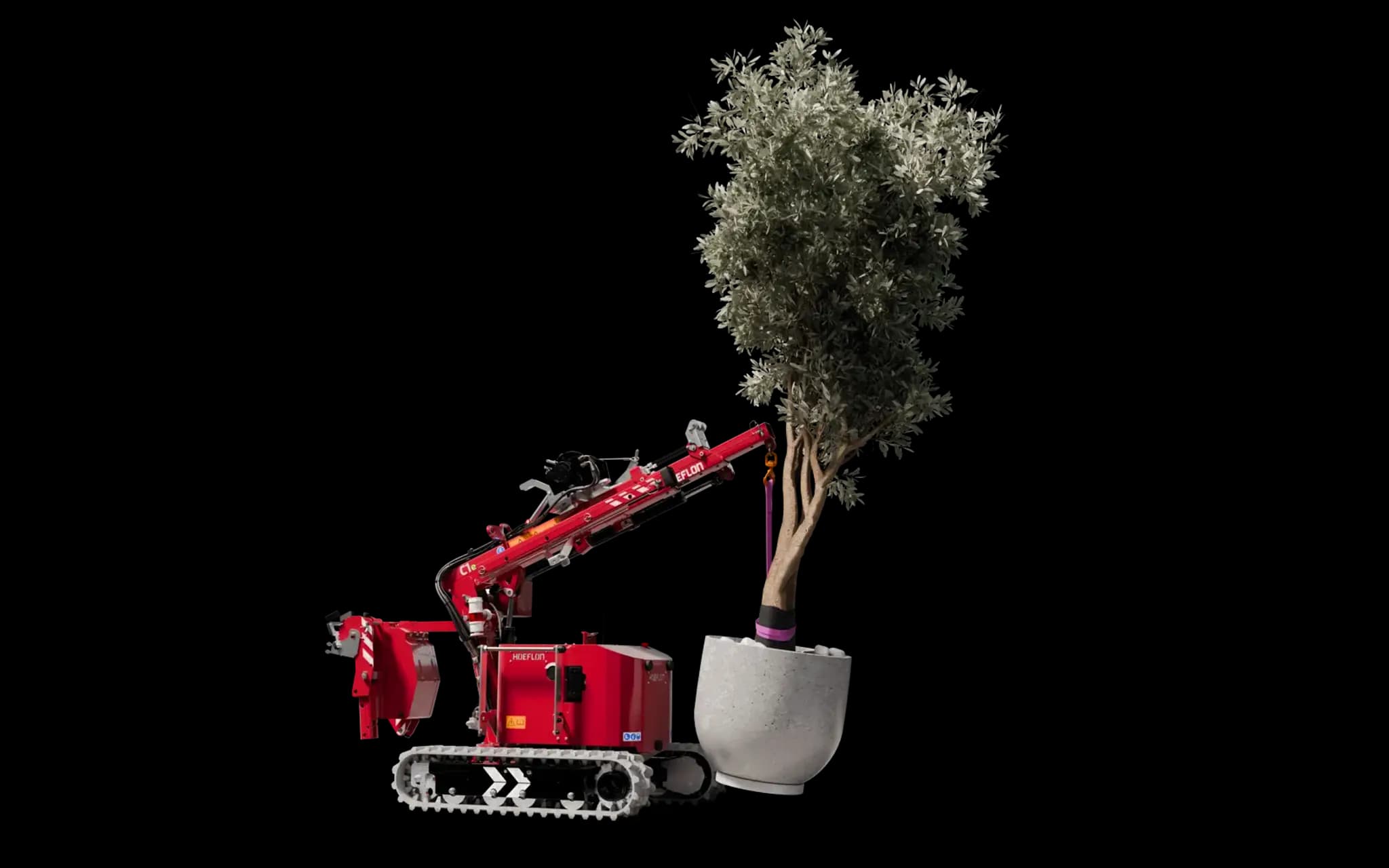 Afbeelding van de Hoeflon C1 kraan in pick-and-carry-modus met een olijfboom.